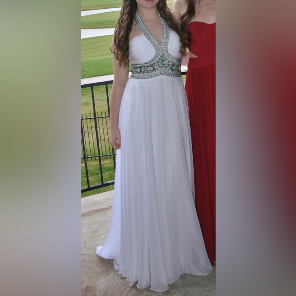 Boutique purchased Madison Grace size 8 formal dress.